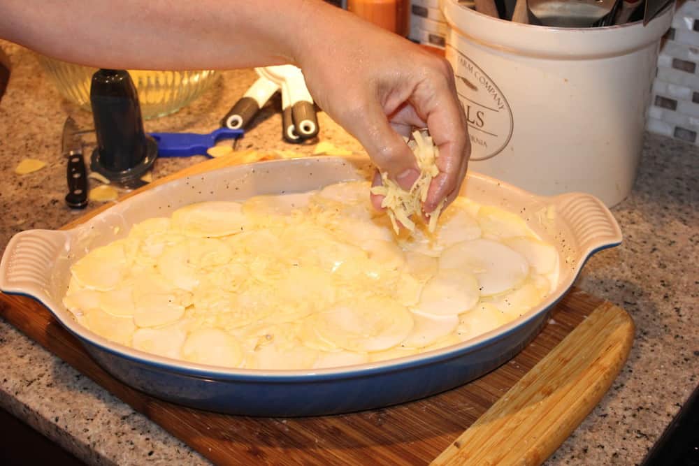 Rub a half a garlic clove on the butter dish