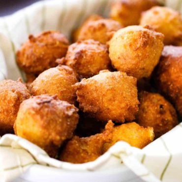 A basket of homemade Southern hush puppies.