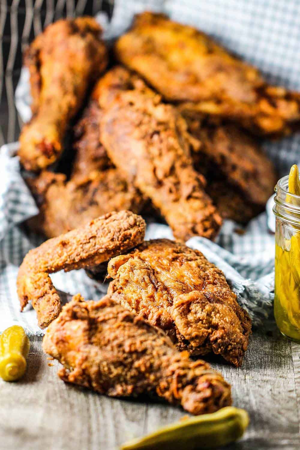 A basket turned on its side with Southern fried chicken