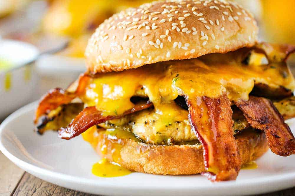 The Ultimate Honey Mustard Chicken Sandwich with bacon and melted cheddar cheese. 