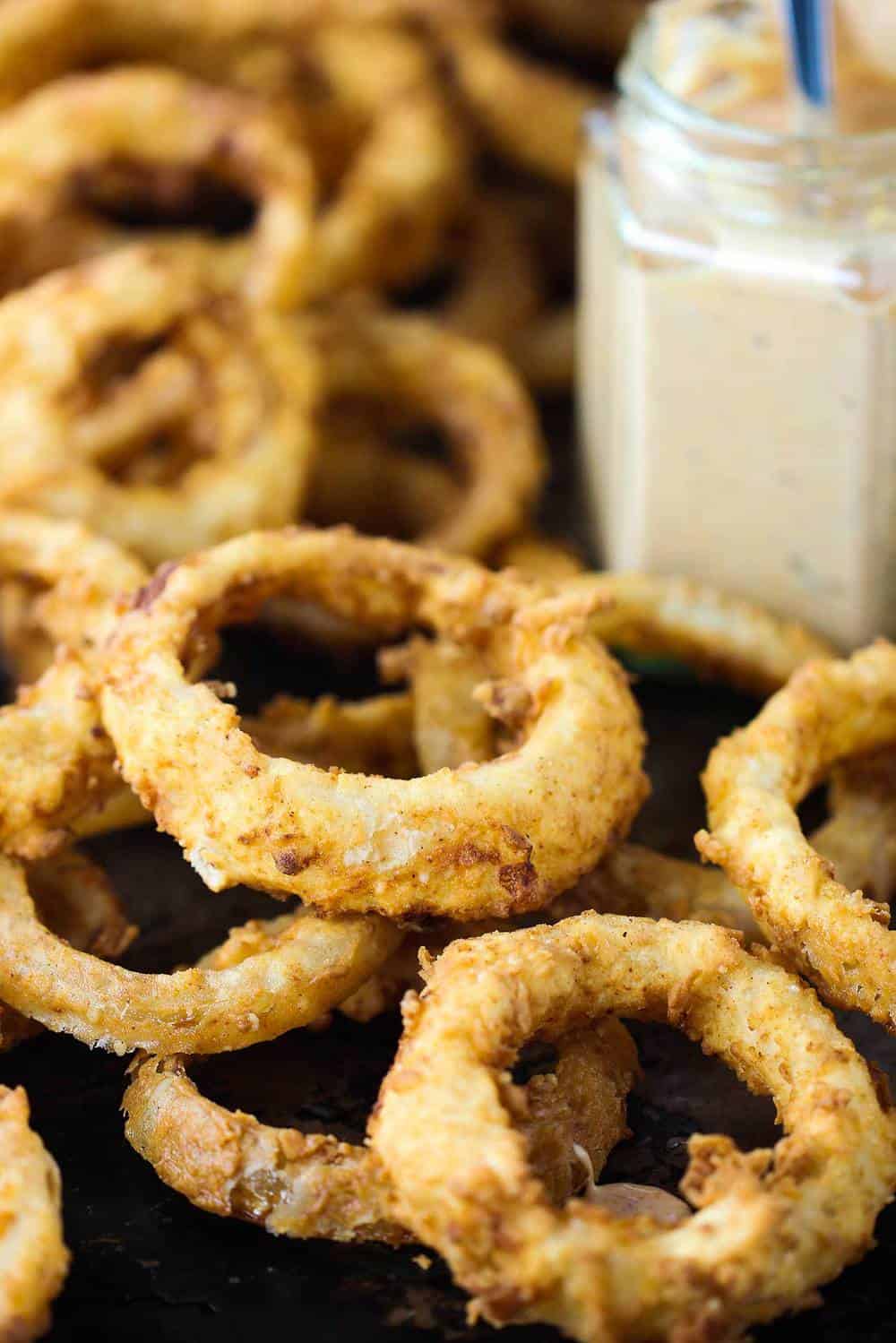 Steak house onion rings on a baking sheet