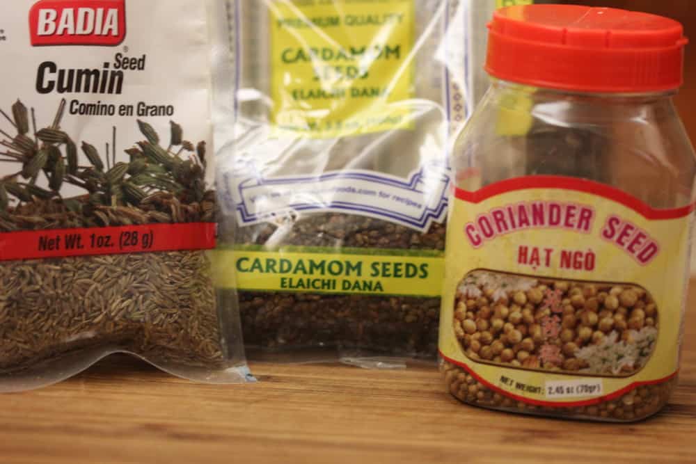 Start with cumin seeds, cardamom seeds and coriander seeds
