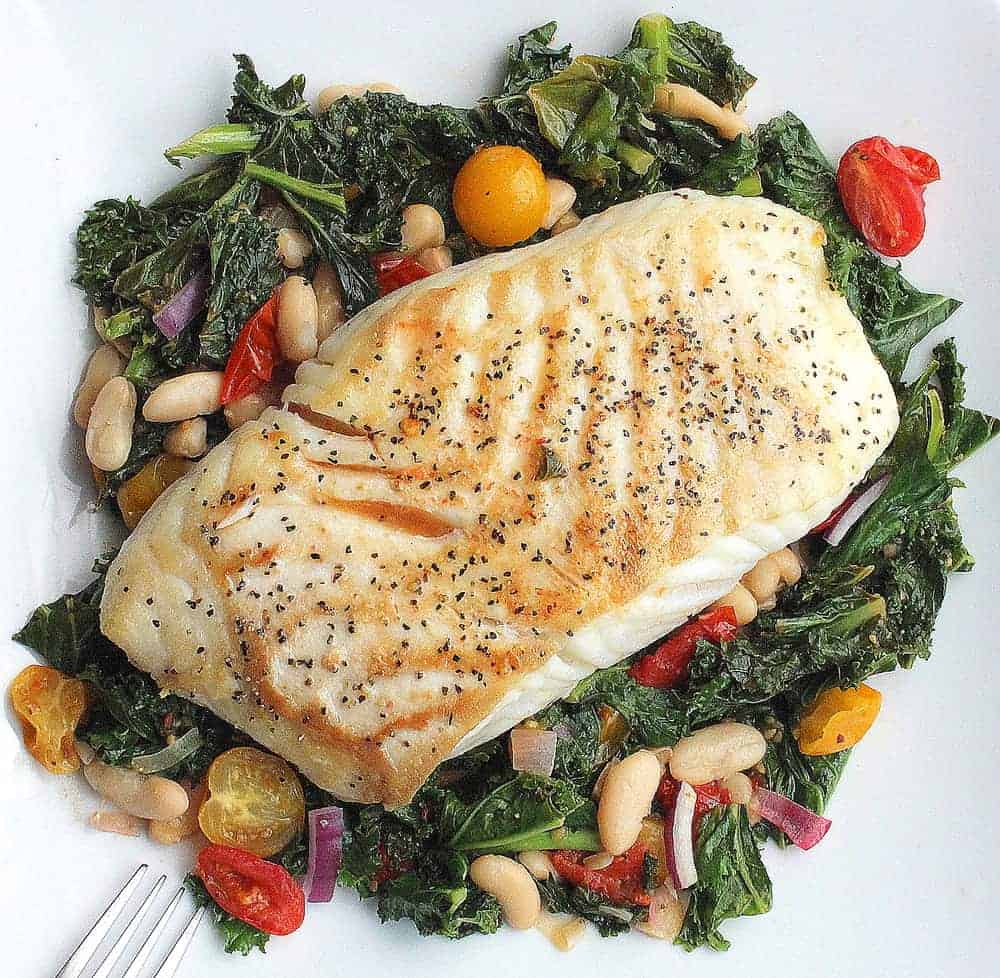 Halibut with braised kale, beans & tomatoes