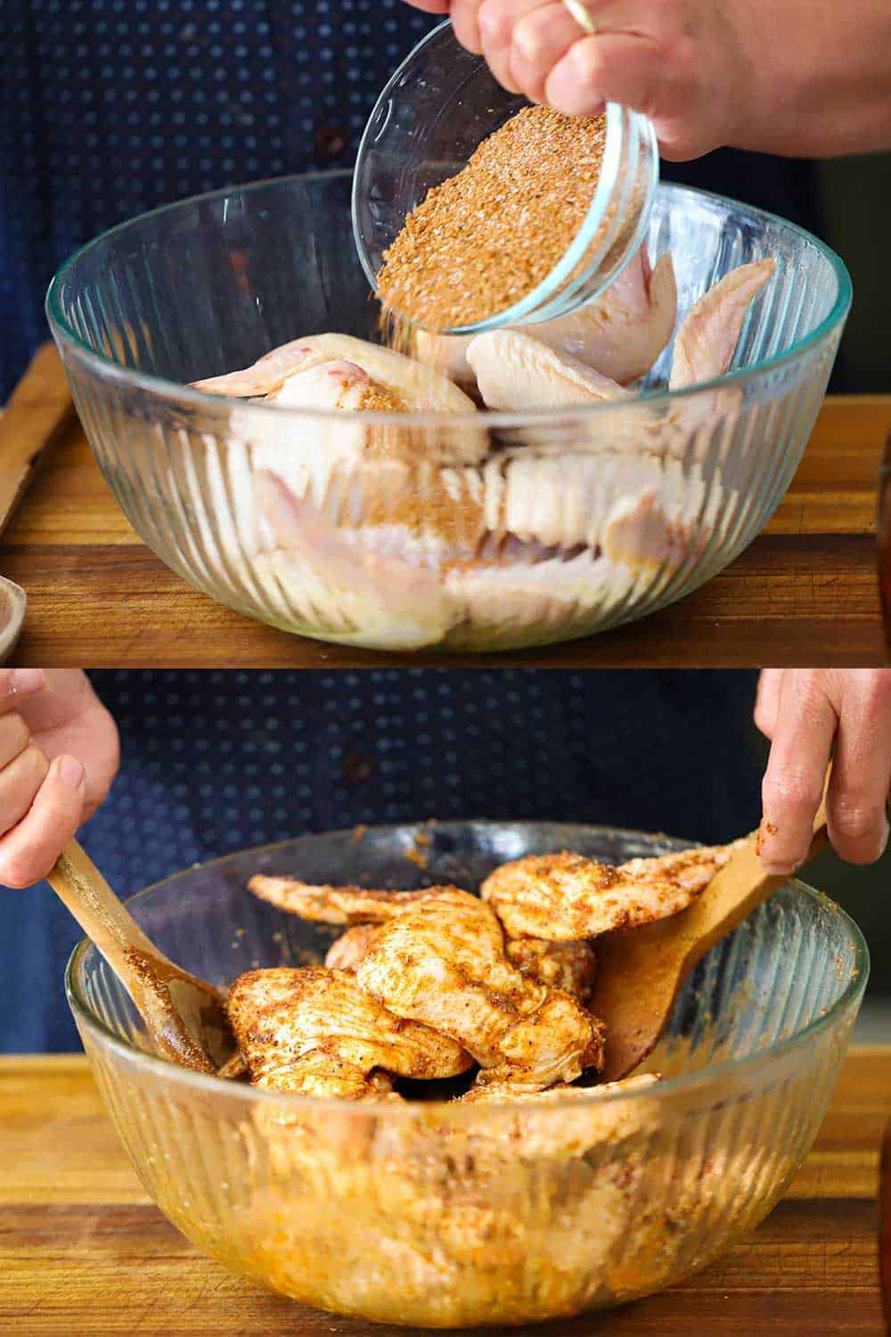 2 stacked photos, the top is a hand dumping a small glass bowl of BBQ rub into a bowl of chicken wings, and the bottom photo is the chicken wings being tossed with two wooden spoons coating the chicken with the rub.