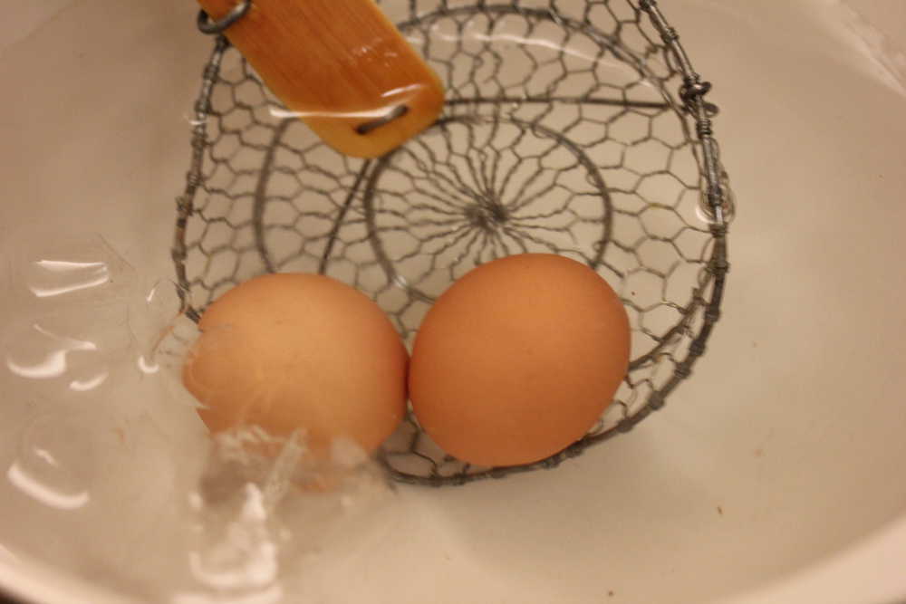 Place the hard boiled eggs in a ice bath after 15 minutes