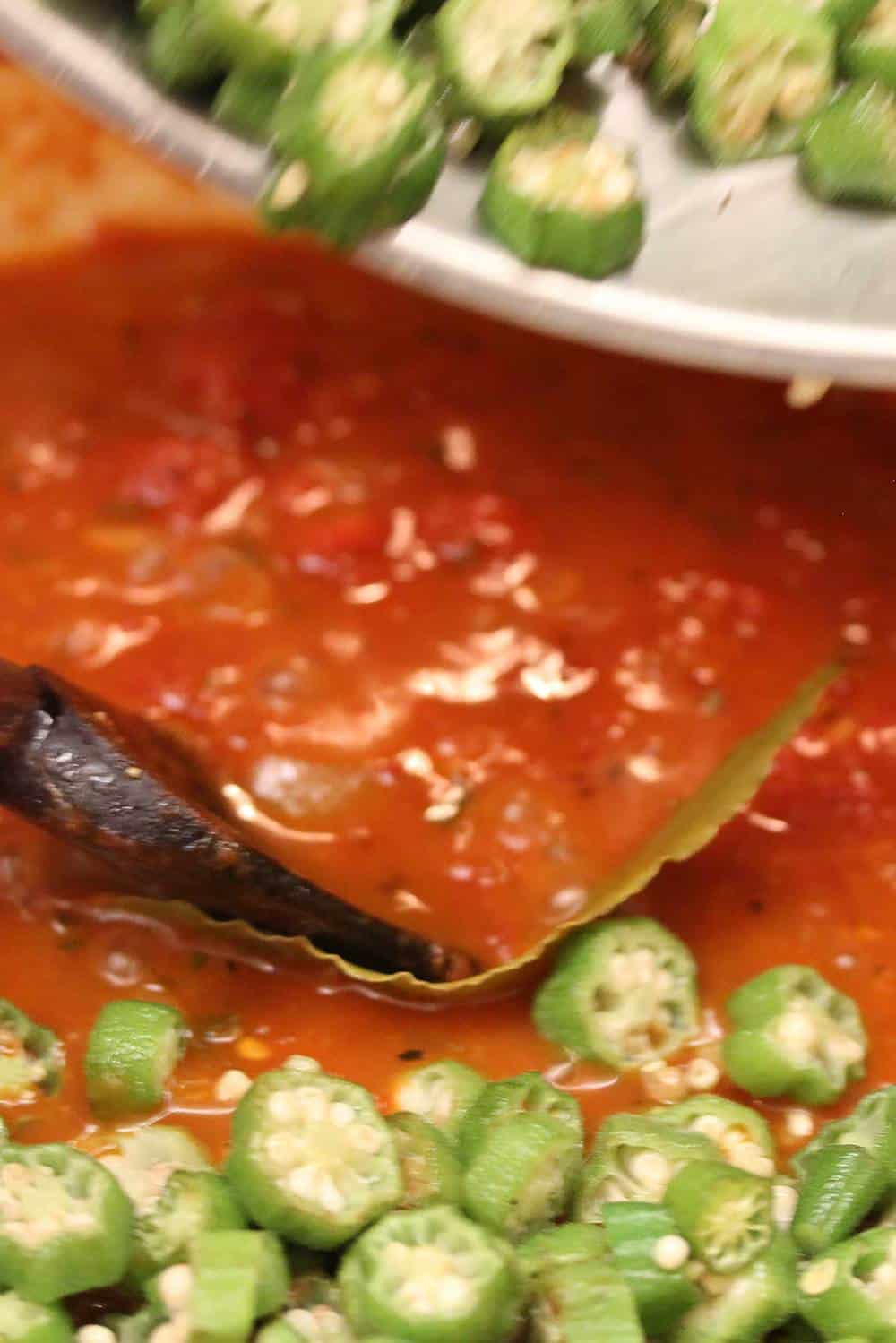 Fresh okra in a skillet with tomatoes