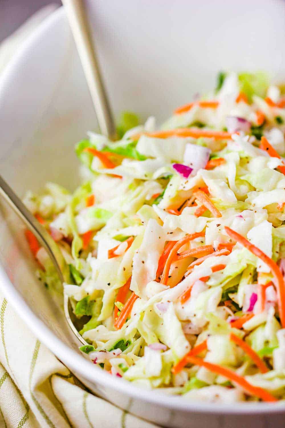 Serve the coleslaw in a large cool serving bowl. 