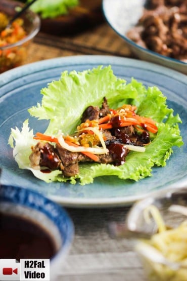 Korean Beef (Bulgogi) Lettuce Wraps on a blue plate