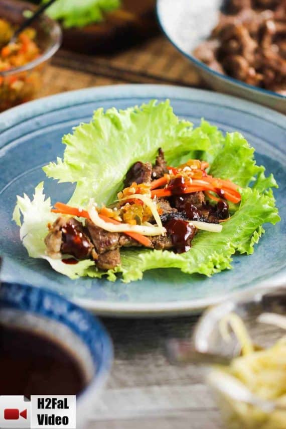 Korean Beef (Bulgogi) Lettuce Wraps on a blue plate
