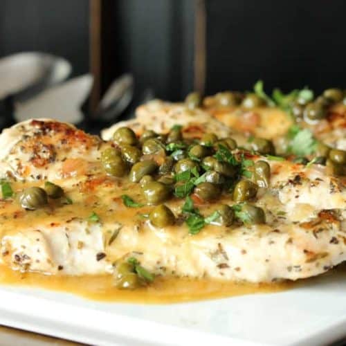 Turkey Cutlets with Honey Mustard-Lime Sauce on a white plate