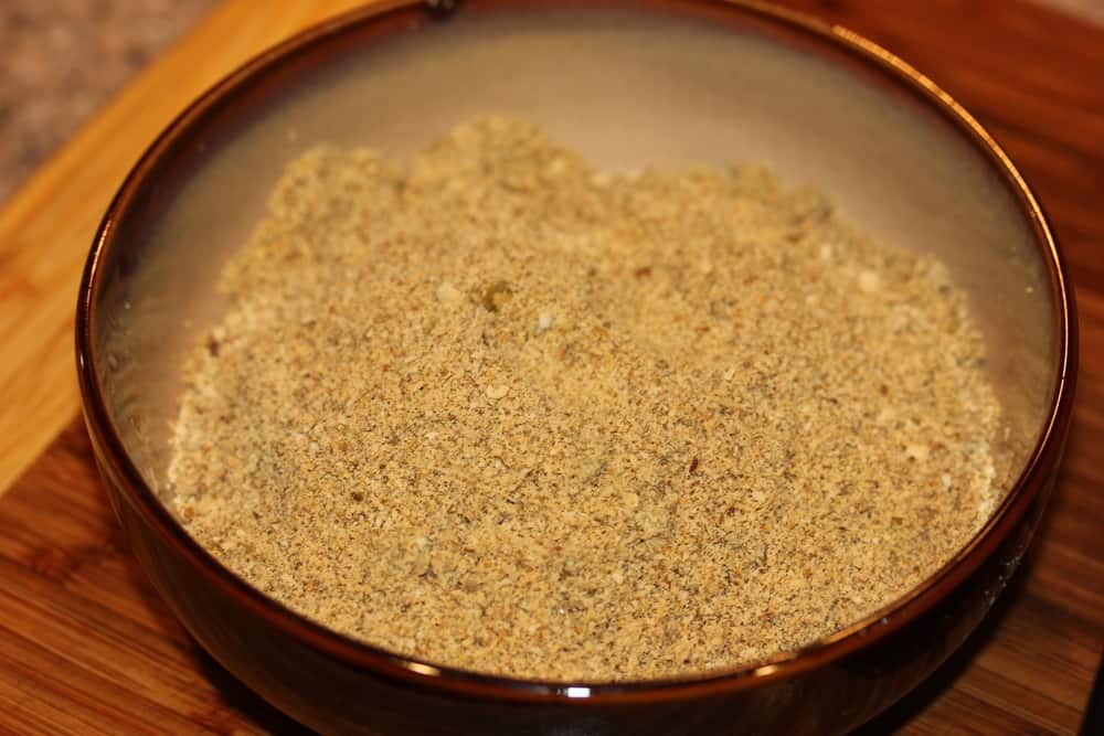Grind the seeds in batches in a coffee or spice grinder