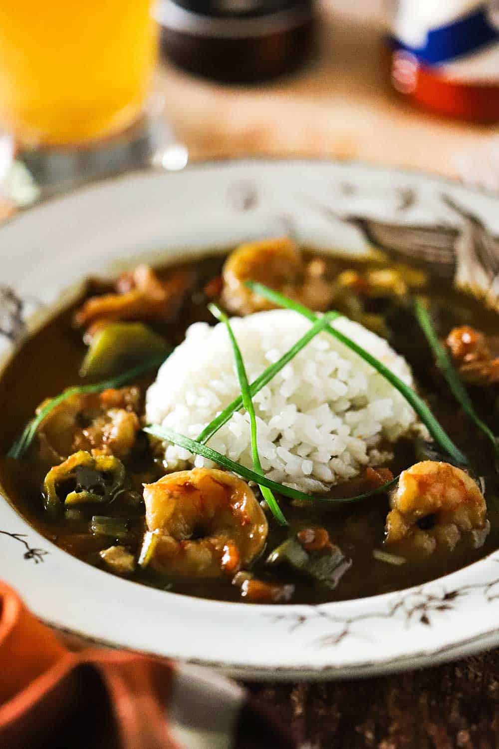 A white boClassic Shrimp and Okra Gumbo in a white bowl