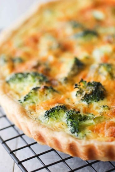 Broccoli and Cheddar Quiche on a cooling rack