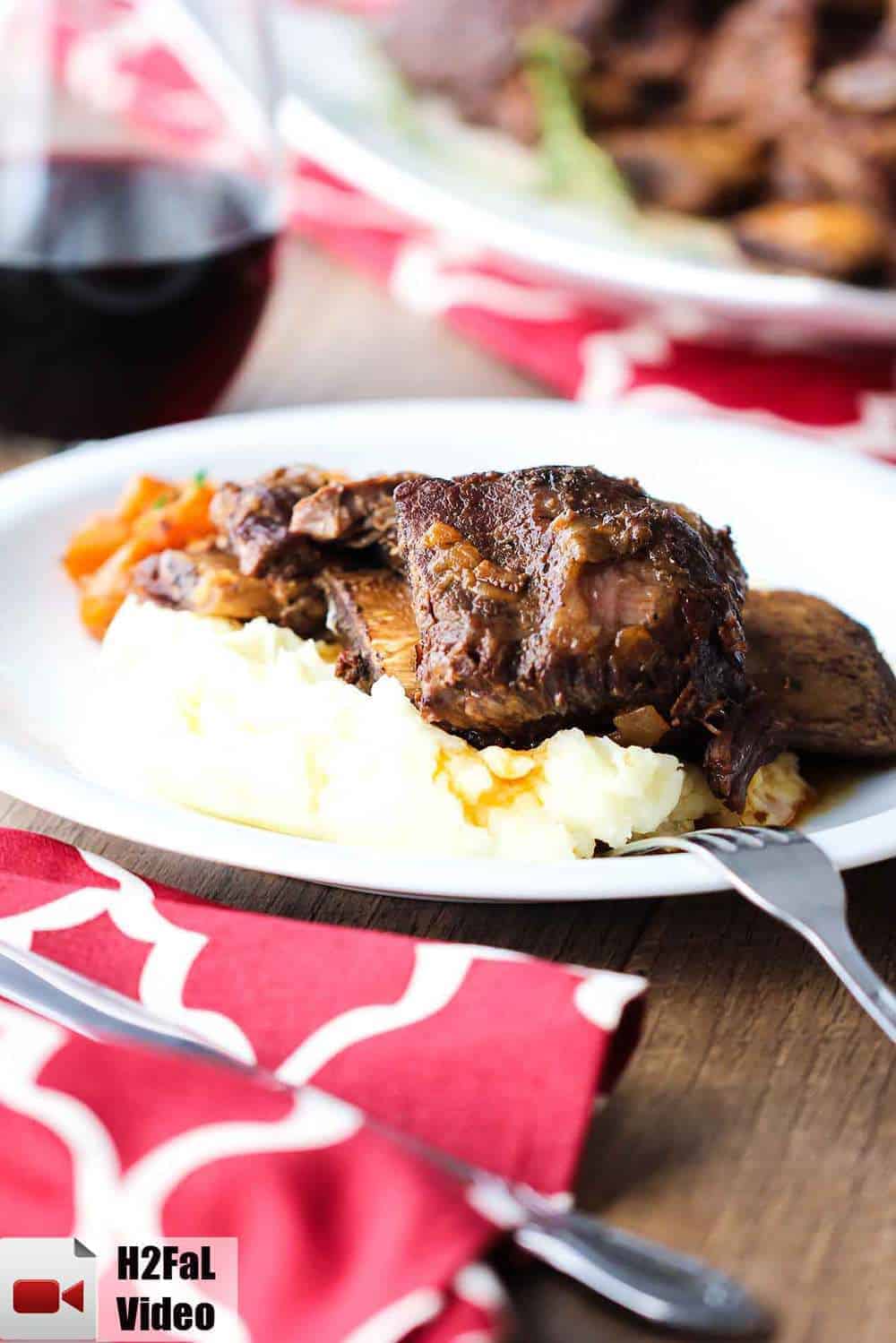 Place the Instant Pot Beef Short Ribs on a serving plate with mashed potatoes.