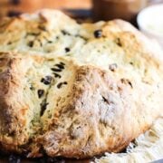 Irish Soda Bread next to a knife and a jar of jam