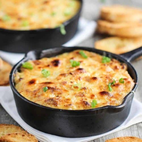 this is a baked jumbo crab au gratin in mini cast iron skillets