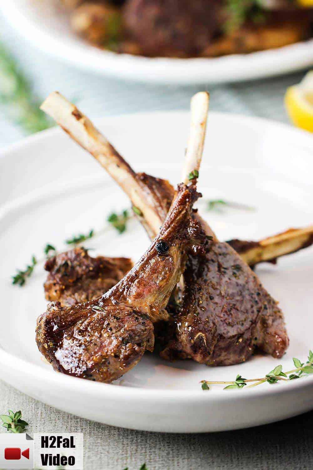 Lamb lollipops in a white bowl