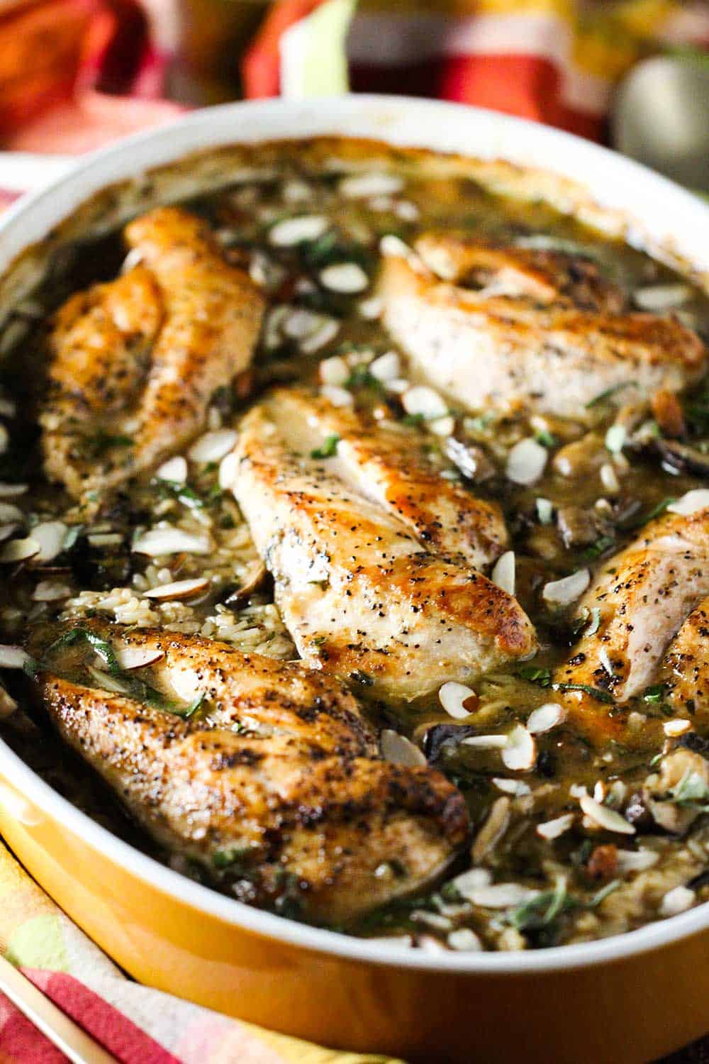 Chicken and sage casserole in a large yellow baking dish. 