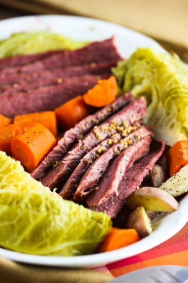 A platter of Instant Pot corned beef and cabbage