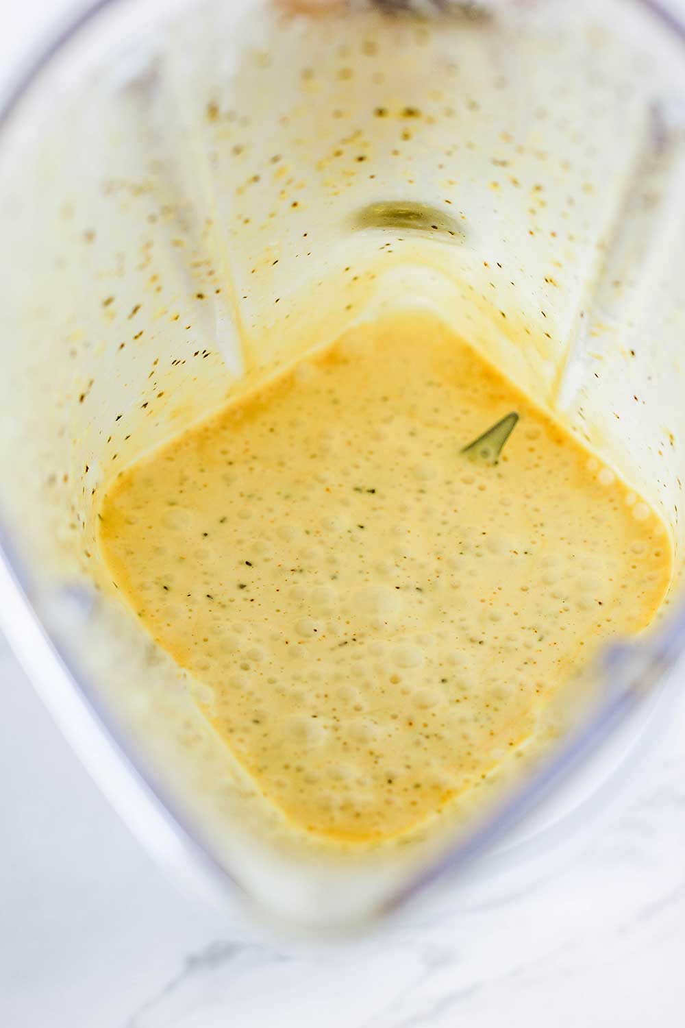 Easy hollandaise sauce inside a blender. 
