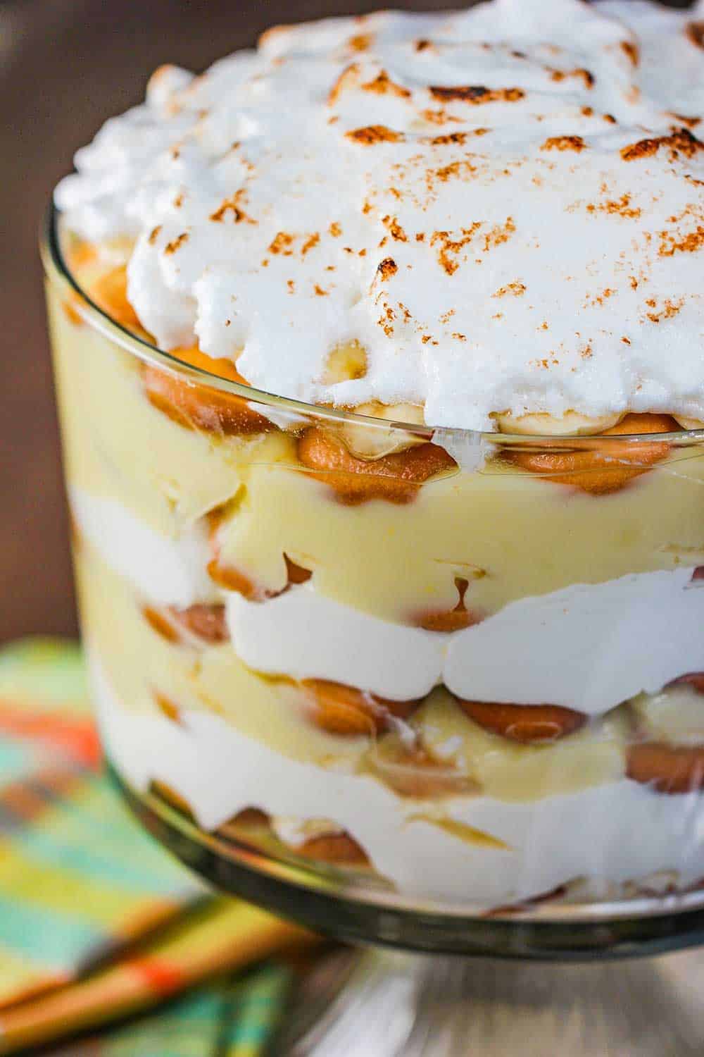 Banana Pudding Trifle with Meringue on a wood table. 