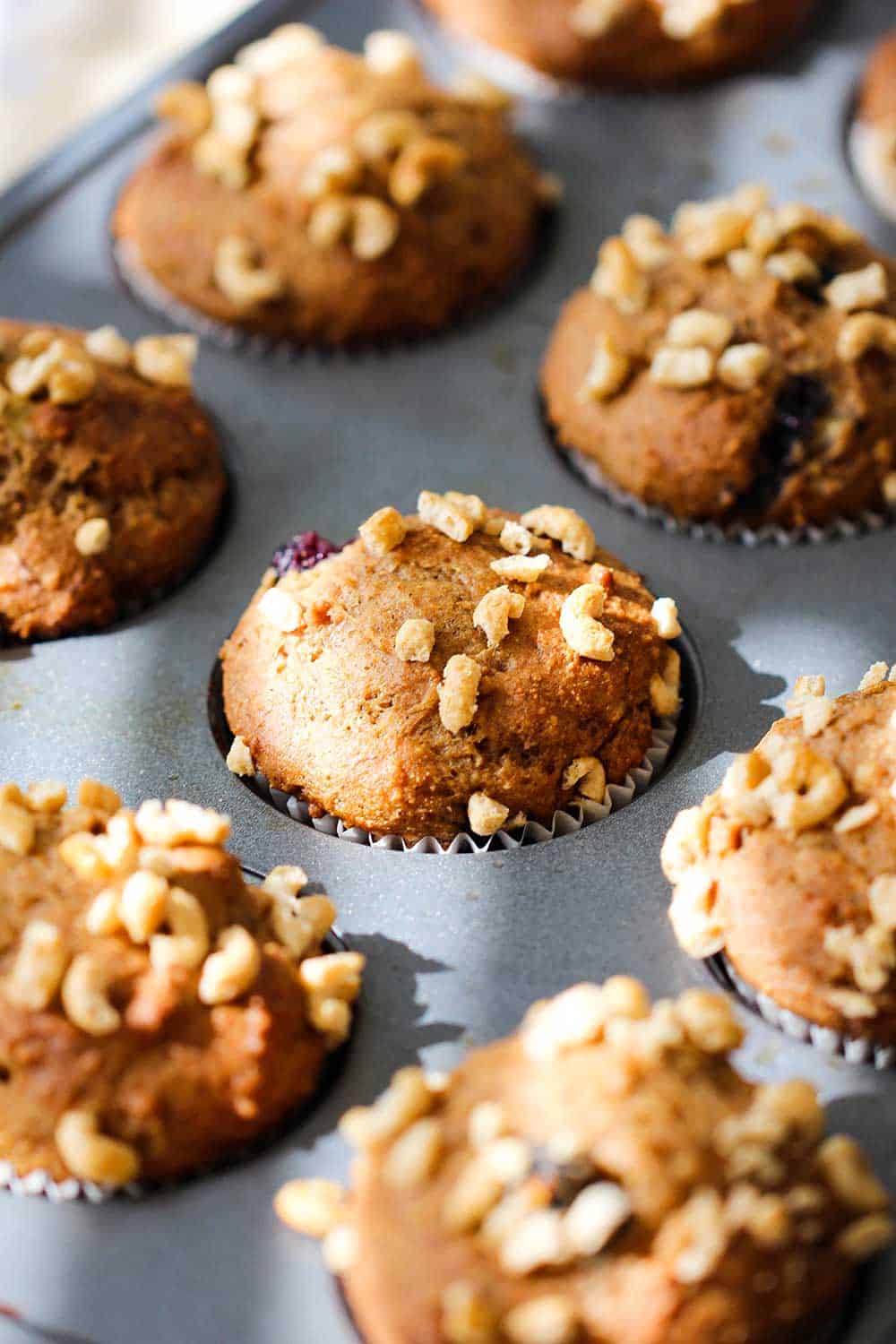 Bake the banana blueberry muffins in a metal muffin tin. 