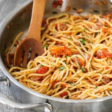 A skillet full of pasta pomodoro