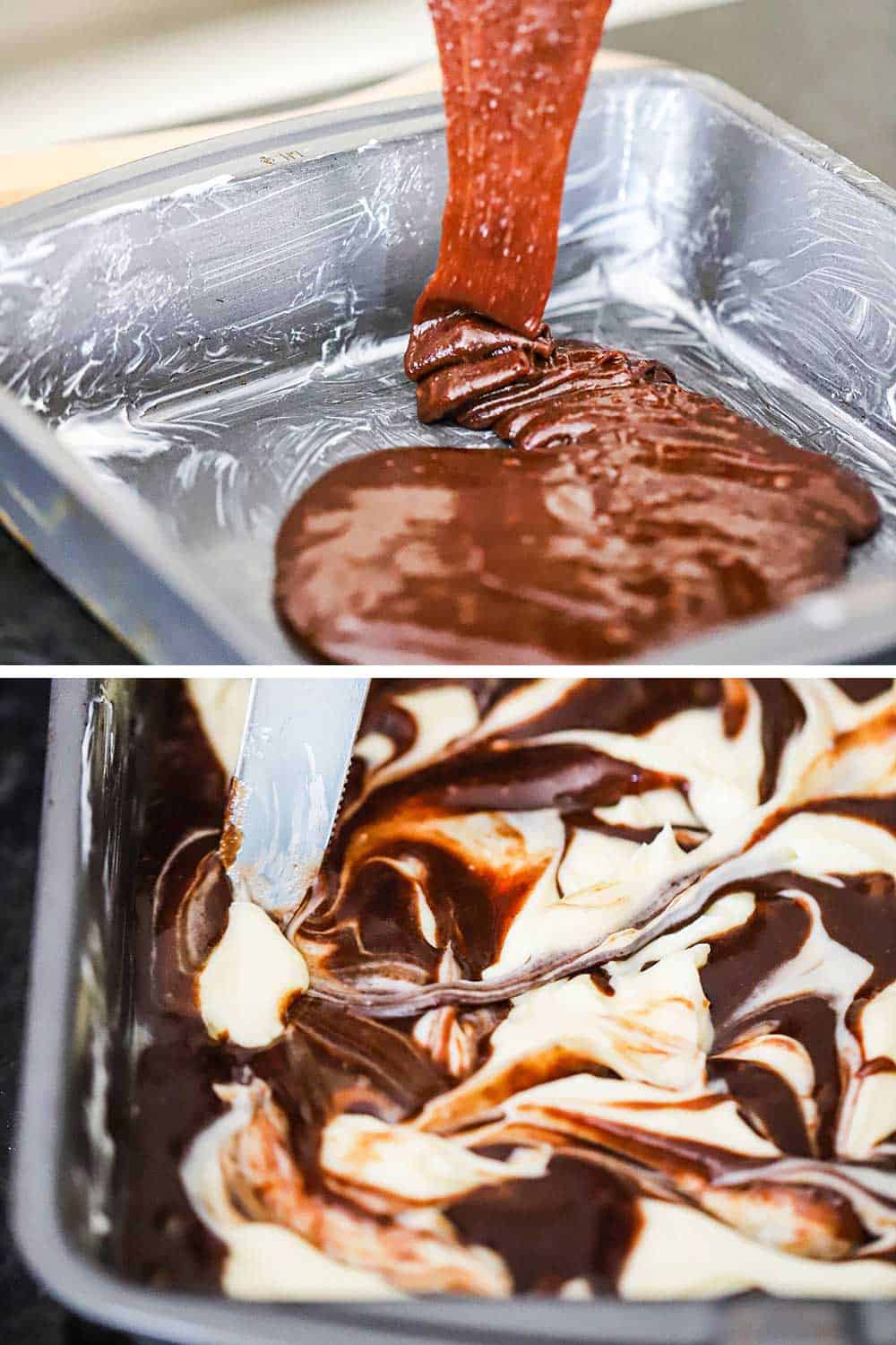 Brownie batter being poured into a greased square metal pan and then cream cheese being swirled into the batter with a knife.