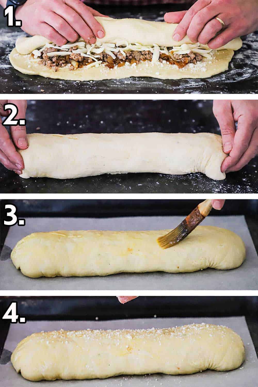 A person rolling up an uncooked stuffed sausage bread and then tucking in the sides, and then brushing an egg wash on top, and then sprinkling grated cheese on top.