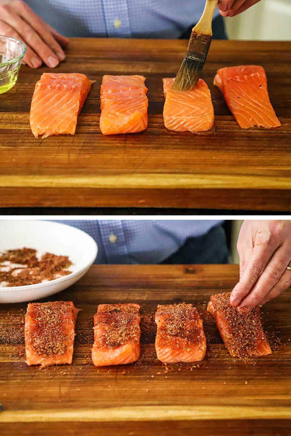 A person brushing olive oil onto the tops of salmon fillets sitting on a cutting board and then blackening seasoning being applied to the fillets by a person's fingers.
