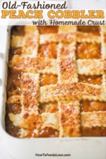 An overhead view of a baked peach cobbler that is topped with a lattice crust and topped with turbinado sugar.