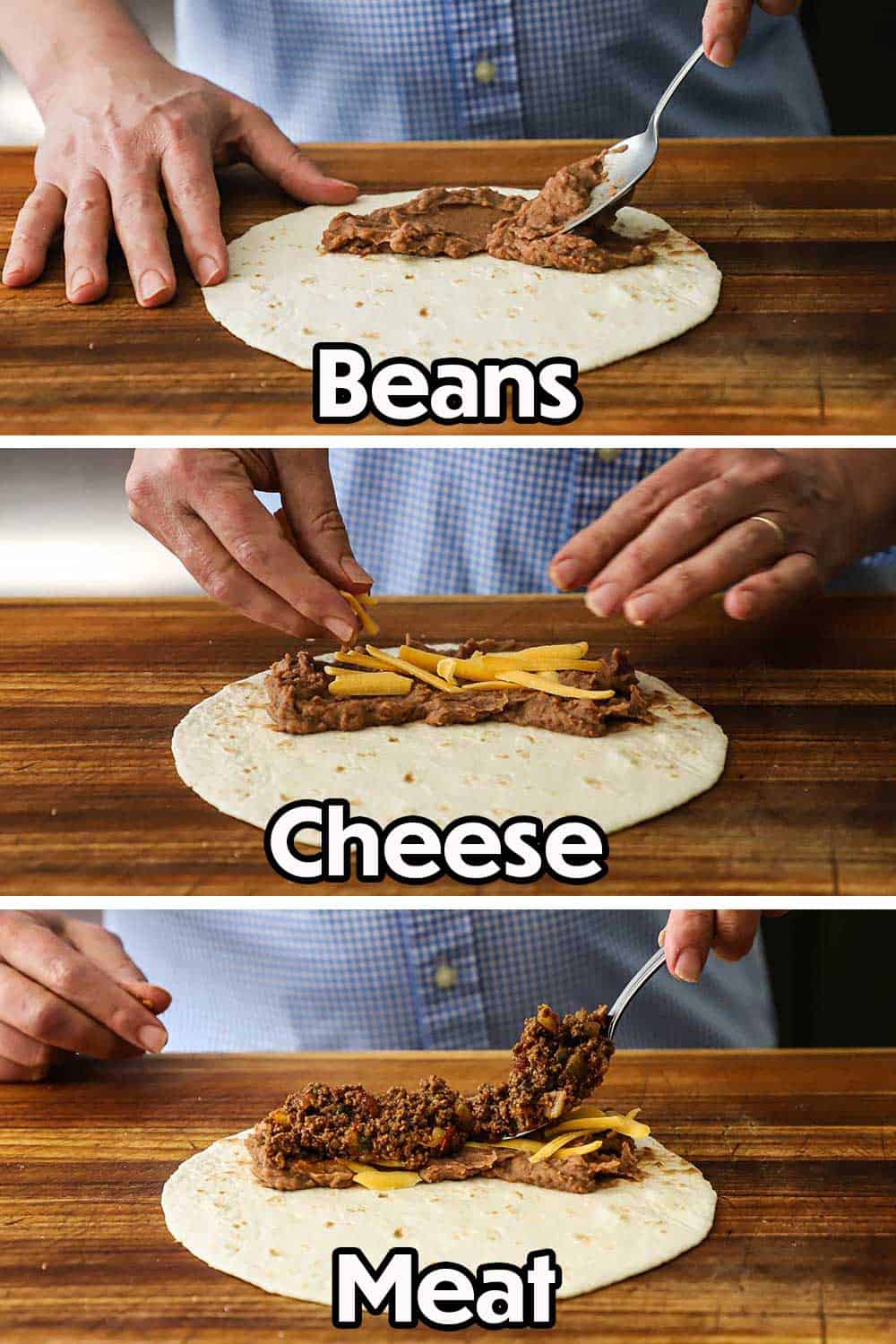 A person using a spoon to spread refried beans on one half of a flour tortilla, and then adding a layer of shredded cheddar cheese, and then topping that with taco meat.