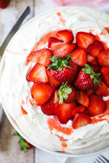 An overhead view of a strawberry pavlova.