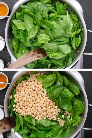 Two photos with the first being an overhead view of a large skillet filled with uncooked spinach leaves and then the other image of white beans on top of the spinach.