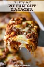 A metal spatula being used to raise a slice of the best weeknight lasagna up from a pan of the same.
