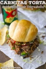 A downward-looking view of a carnitas torta resting on white wax pepper with a Mexican beef behind it.