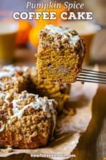 A person using a metal spatula to raise a square piece of Pumpkin Spice Coffee Cake from other slices of the cake that are all resting on brown paper.